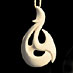 Stylized fish hook pendants represent prosperity,abundance, fertility and strength.